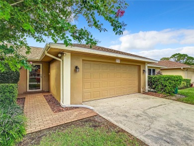 Welcome to your dream home in the serene Feather Sound Country on Feather Sound Country Club in Florida - for sale on GolfHomes.com, golf home, golf lot