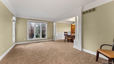 Wake up to greenside views of a golf course designed by renowned on Pheasant Run Golf Club in Michigan - for sale on GolfHomes.com, golf home, golf lot