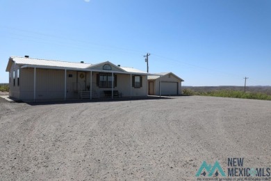 3-bedroom, 2-bath manufactured home on a large 0.67-acre lot in on Sierra Del Rio Golf Club in New Mexico - for sale on GolfHomes.com, golf home, golf lot
