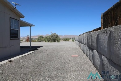 3-bedroom, 2-bath manufactured home on a large 0.67-acre lot in on Sierra Del Rio Golf Club in New Mexico - for sale on GolfHomes.com, golf home, golf lot