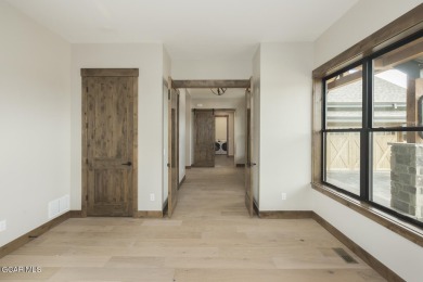 This stunning 3-bedroom ranch home offers breathtaking views on Grand Elk Ranch and Club in Colorado - for sale on GolfHomes.com, golf home, golf lot