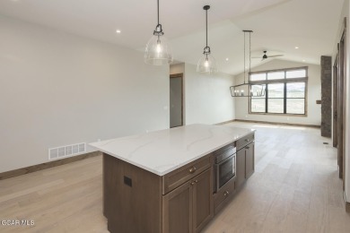 This stunning 3-bedroom ranch home offers breathtaking views on Grand Elk Ranch and Club in Colorado - for sale on GolfHomes.com, golf home, golf lot