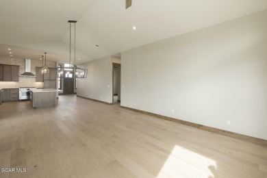 This stunning 3-bedroom ranch home offers breathtaking views on Grand Elk Ranch and Club in Colorado - for sale on GolfHomes.com, golf home, golf lot