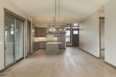 This stunning 3-bedroom ranch home offers breathtaking views on Grand Elk Ranch and Club in Colorado - for sale on GolfHomes.com, golf home, golf lot