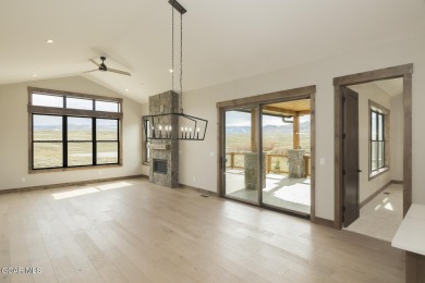 This stunning 3-bedroom ranch home offers breathtaking views on Grand Elk Ranch and Club in Colorado - for sale on GolfHomes.com, golf home, golf lot