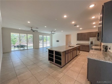 Move-in ready and situated on a desirable corner double lot on Sugarmill Woods Golf and Country Club in Florida - for sale on GolfHomes.com, golf home, golf lot