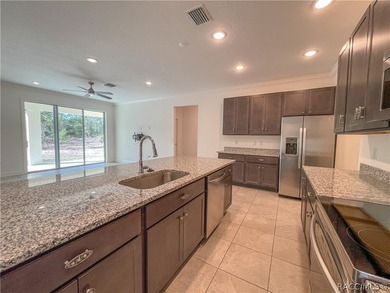 Move-in ready and situated on a desirable corner double lot on Sugarmill Woods Golf and Country Club in Florida - for sale on GolfHomes.com, golf home, golf lot