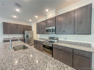 Move-in ready and situated on a desirable corner double lot on Sugarmill Woods Golf and Country Club in Florida - for sale on GolfHomes.com, golf home, golf lot