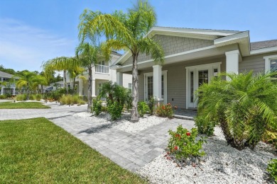 Welcome Home to luxury in this 2BD/2BA/2CG cottage home on an on Venetian Bay Golf Course in Florida - for sale on GolfHomes.com, golf home, golf lot