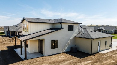 This new construction home in The Powder Horn Golf Community on The Powder Horn Golf Club - Mountain in Wyoming - for sale on GolfHomes.com, golf home, golf lot