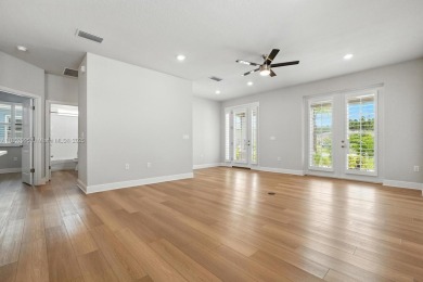 Welcome Home to luxury in this 2BD/2BA/2CG cottage home on an on Venetian Bay Golf Course in Florida - for sale on GolfHomes.com, golf home, golf lot