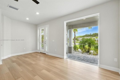 Welcome Home to luxury in this 2BD/2BA/2CG cottage home on an on Venetian Bay Golf Course in Florida - for sale on GolfHomes.com, golf home, golf lot