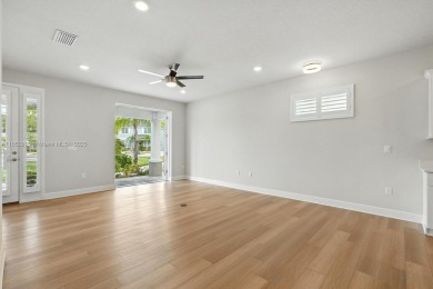 Welcome Home to luxury in this 2BD/2BA/2CG cottage home on an on Venetian Bay Golf Course in Florida - for sale on GolfHomes.com, golf home, golf lot