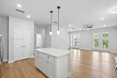 Welcome Home to luxury in this 2BD/2BA/2CG cottage home on an on Venetian Bay Golf Course in Florida - for sale on GolfHomes.com, golf home, golf lot
