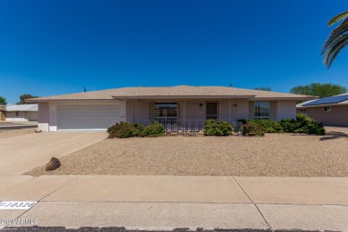 Well-cared for home on oversized corner lot. Spacious floorplan on Sun City Lakes West and East in Arizona - for sale on GolfHomes.com, golf home, golf lot