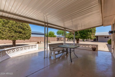 Well-cared for home on oversized corner lot. Spacious floorplan on Sun City Lakes West and East in Arizona - for sale on GolfHomes.com, golf home, golf lot