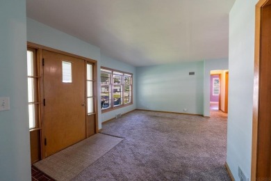 Location! Location! Location is only one of the stand-out on Irv Warren Memorial Golf Course in Iowa - for sale on GolfHomes.com, golf home, golf lot