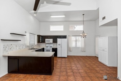 Highly sought after 3 bedroom, 2 1/4 bath townhome located on Mesa Del Sol Golf Club in Arizona - for sale on GolfHomes.com, golf home, golf lot