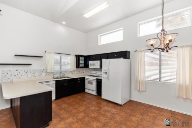 Highly sought after 3 bedroom, 2 1/4 bath townhome located on Mesa Del Sol Golf Club in Arizona - for sale on GolfHomes.com, golf home, golf lot