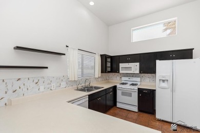 Highly sought after 3 bedroom, 2 1/4 bath townhome located on Mesa Del Sol Golf Club in Arizona - for sale on GolfHomes.com, golf home, golf lot