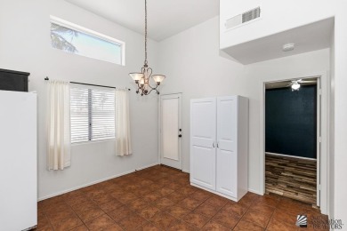 Highly sought after 3 bedroom, 2 1/4 bath townhome located on Mesa Del Sol Golf Club in Arizona - for sale on GolfHomes.com, golf home, golf lot