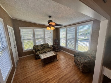 This 2 bedrooms, 2 bathrooms stucco home is being sold furnished on Del Tura Golf and Country Club in Florida - for sale on GolfHomes.com, golf home, golf lot