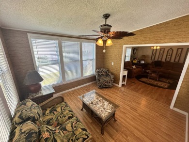 This 2 bedrooms, 2 bathrooms stucco home is being sold furnished on Del Tura Golf and Country Club in Florida - for sale on GolfHomes.com, golf home, golf lot