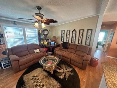 This 2 bedrooms, 2 bathrooms stucco home is being sold furnished on Del Tura Golf and Country Club in Florida - for sale on GolfHomes.com, golf home, golf lot