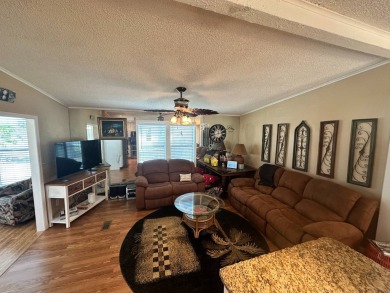 This 2 bedrooms, 2 bathrooms stucco home is being sold furnished on Del Tura Golf and Country Club in Florida - for sale on GolfHomes.com, golf home, golf lot