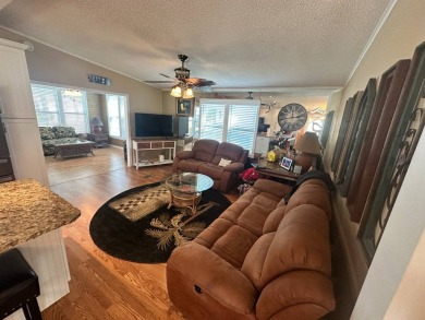 This 2 bedrooms, 2 bathrooms stucco home is being sold furnished on Del Tura Golf and Country Club in Florida - for sale on GolfHomes.com, golf home, golf lot