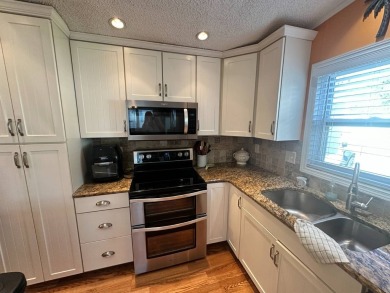 This 2 bedrooms, 2 bathrooms stucco home is being sold furnished on Del Tura Golf and Country Club in Florida - for sale on GolfHomes.com, golf home, golf lot