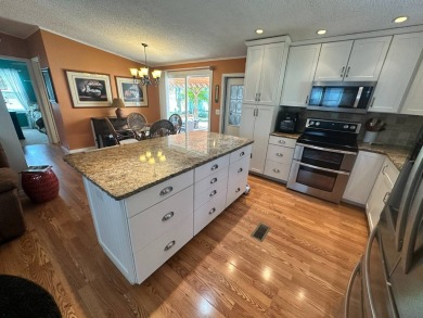 This 2 bedrooms, 2 bathrooms stucco home is being sold furnished on Del Tura Golf and Country Club in Florida - for sale on GolfHomes.com, golf home, golf lot