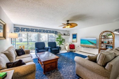 ALL ONE LEVEL SPACIOUS & SUNNY! Rare 3 bedroom condo with flex on Riverbend Golf Club in Florida - for sale on GolfHomes.com, golf home, golf lot