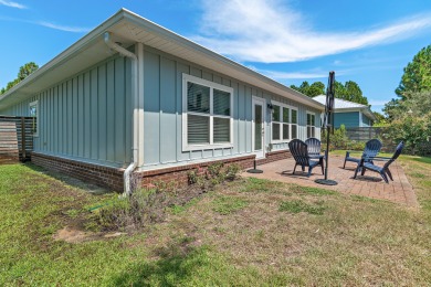 Welcome to your dream retreat at 166 Ocean Spray Circle, nestled on Santa Rosa Golf and Beach Club in Florida - for sale on GolfHomes.com, golf home, golf lot