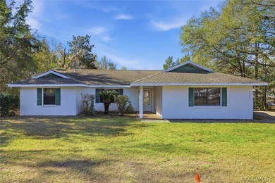 It's a TRAP! You'll get stuck and fall in love with this one on Citrus Springs Country Club in Florida - for sale on GolfHomes.com, golf home, golf lot