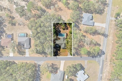 It's a TRAP! You'll get stuck and fall in love with this one on Citrus Springs Country Club in Florida - for sale on GolfHomes.com, golf home, golf lot