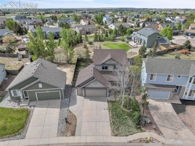 This beautifully maintained 2-story home tucked into the on Antler Creek Golf Course in Colorado - for sale on GolfHomes.com, golf home, golf lot