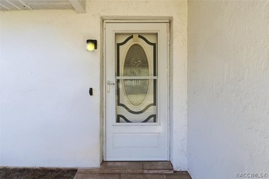 It's a TRAP! You'll get stuck and fall in love with this one on Citrus Springs Country Club in Florida - for sale on GolfHomes.com, golf home, golf lot