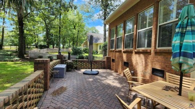 Discover this beautifully crafted 4-bedroom, all-brick home in on Landings Golf Club in Georgia - for sale on GolfHomes.com, golf home, golf lot