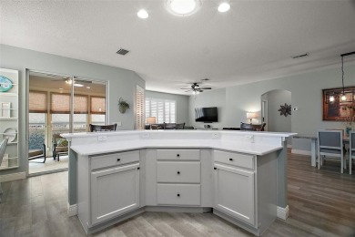 BOND PAID! STUNNING TURNKEY SOMERSET MODEL WITH GOLF CART on The Links of Spruce Creek in Florida - for sale on GolfHomes.com, golf home, golf lot
