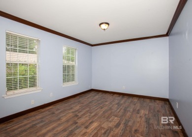 This Charming Two Story Cottage Is The Perfect Place To Call on Lake Forest Yacht and Country Club in Alabama - for sale on GolfHomes.com, golf home, golf lot