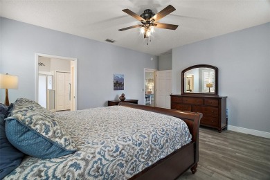 BOND PAID! STUNNING TURNKEY SOMERSET MODEL WITH GOLF CART on The Links of Spruce Creek in Florida - for sale on GolfHomes.com, golf home, golf lot