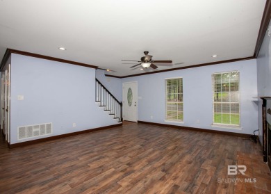 This Charming Two Story Cottage Is The Perfect Place To Call on Lake Forest Yacht and Country Club in Alabama - for sale on GolfHomes.com, golf home, golf lot