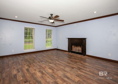 This Charming Two Story Cottage Is The Perfect Place To Call on Lake Forest Yacht and Country Club in Alabama - for sale on GolfHomes.com, golf home, golf lot