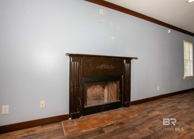 This Charming Two Story Cottage Is The Perfect Place To Call on Lake Forest Yacht and Country Club in Alabama - for sale on GolfHomes.com, golf home, golf lot