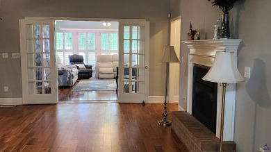 Discover this beautifully crafted 4-bedroom, all-brick home in on Landings Golf Club in Georgia - for sale on GolfHomes.com, golf home, golf lot