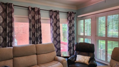 Discover this beautifully crafted 4-bedroom, all-brick home in on Landings Golf Club in Georgia - for sale on GolfHomes.com, golf home, golf lot