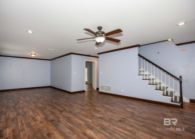 This Charming Two Story Cottage Is The Perfect Place To Call on Lake Forest Yacht and Country Club in Alabama - for sale on GolfHomes.com, golf home, golf lot