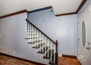 This Charming Two Story Cottage Is The Perfect Place To Call on Lake Forest Yacht and Country Club in Alabama - for sale on GolfHomes.com, golf home, golf lot