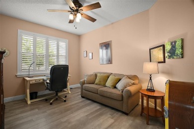 BOND PAID! STUNNING TURNKEY SOMERSET MODEL WITH GOLF CART on The Links of Spruce Creek in Florida - for sale on GolfHomes.com, golf home, golf lot